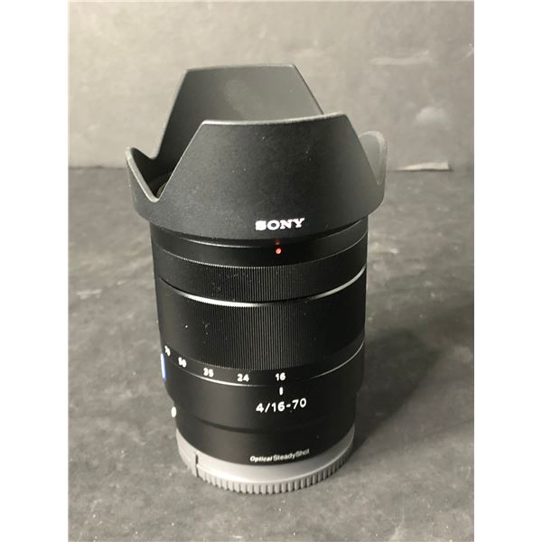Sony Vario-Tessar T* E 16-70mm F4 ZA OSS SEL1670Z lens - retail $1,049.99 - new open box, no box