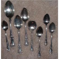8 STERLING SILVER SPOONS