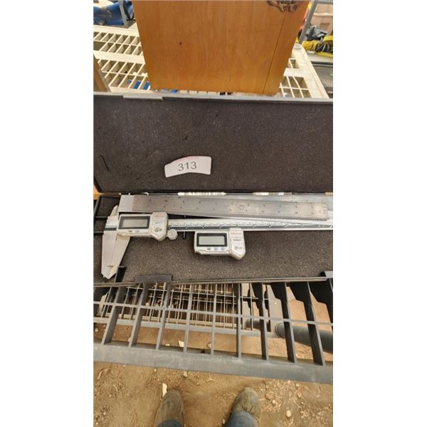 Micrometer and rulers in case