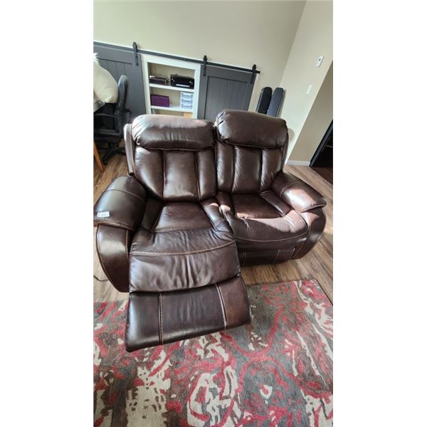 Leather reclining love seat in good condition