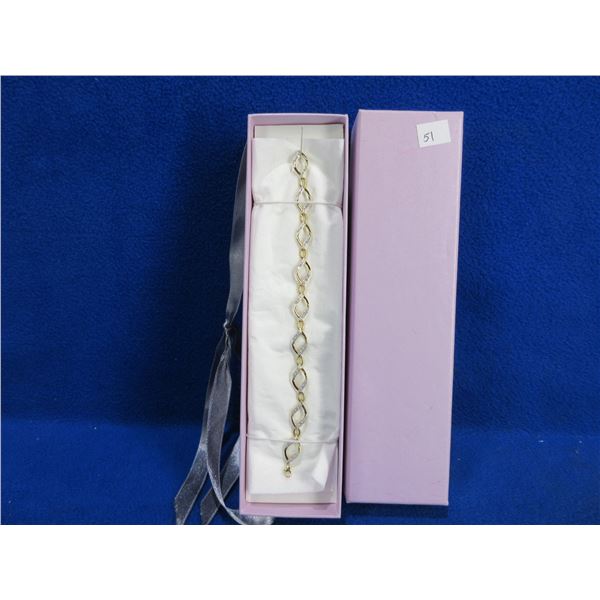 7 1/2" 10 Karat Gold & Diamond Bracelet