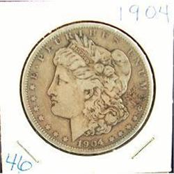 1904 AND 1879 S MORGAN SILVER DOLLARS