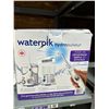 Image 1 : Waterpik Water Flosser System