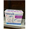 Image 1 : Waterpik Water Flosser System
