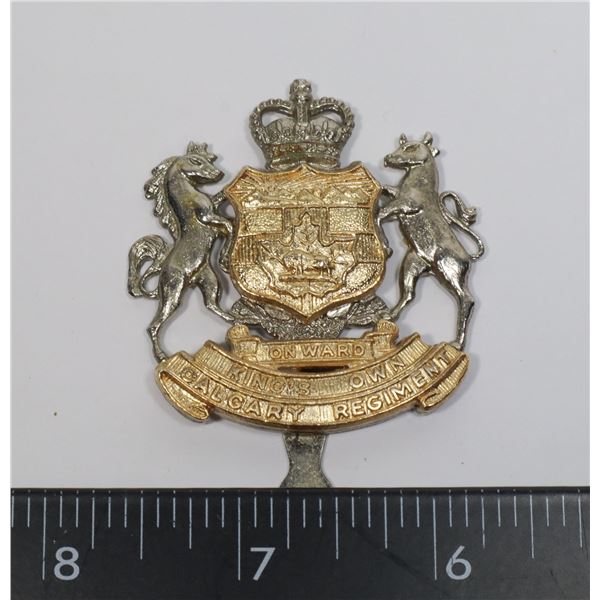 #418 KINGS OWN CALGARY REGIMENT CAP BADGE