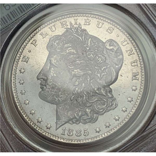 1885-O Morgan Silver Dollar NGC MS64 OGH