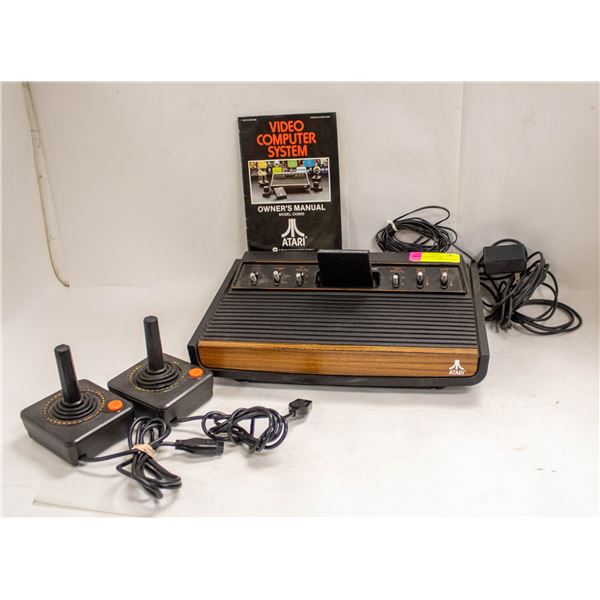 ATARI 2600 CONSOLE W CONTROLLERS & GAME