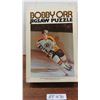 Image 1 : 500 pc Puzzle Boston Bruins Bobby Orr 16" x 24"