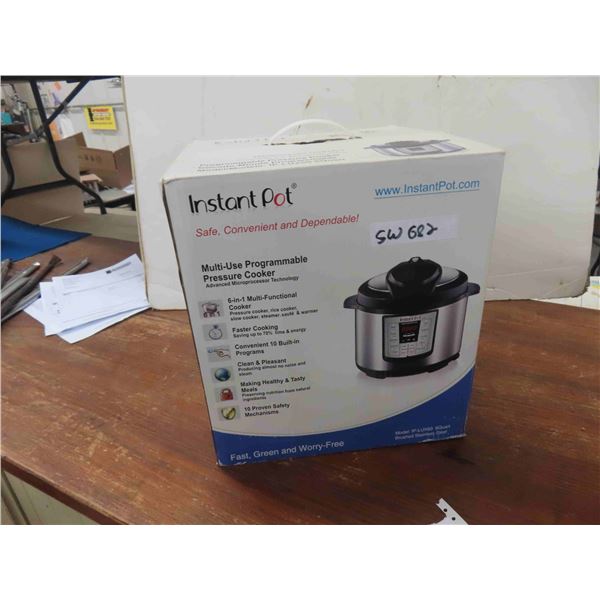 New Instant Pot Programmable Pressure Cooker