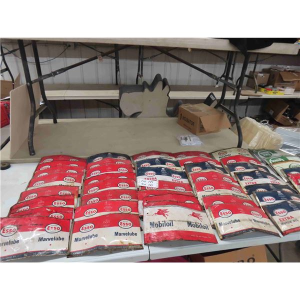 47 Flattened Oil Cans; Esso, Quaker State