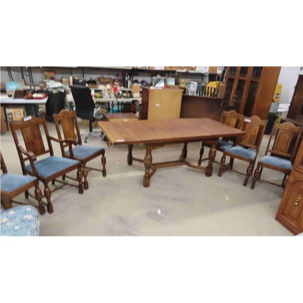 Solid Oak Table with 6 Chairs -  1 of which is Captain