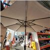Image 2 : LED CORDLESS PATIO UMBERELLA WITH LIGHTS ON ALL ARM TESTED AND WORKING