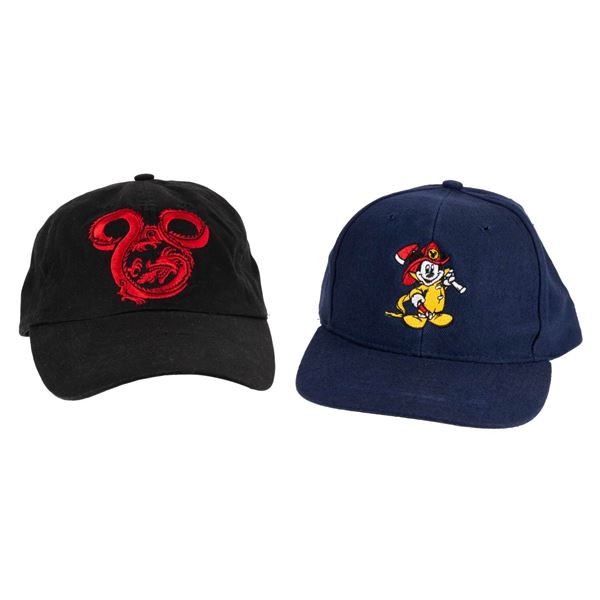 A Disneyland Fireman Mickey and Mushu Dragon Cast Member Hats.