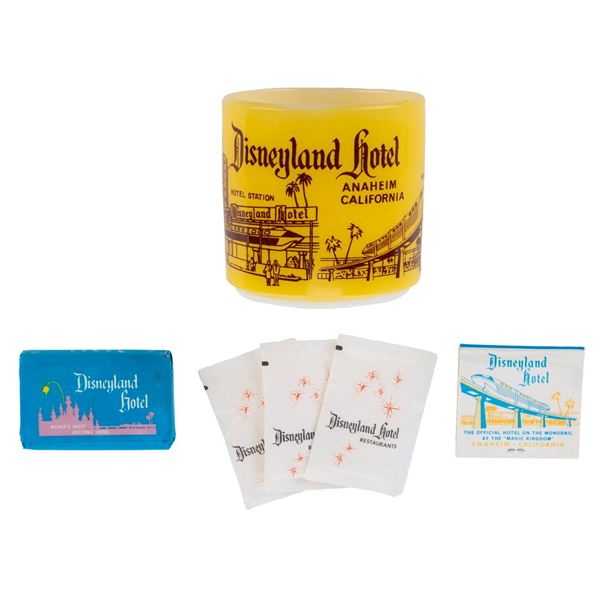 A Disneyland Hotel Mug and Complimentary Souvenirs.