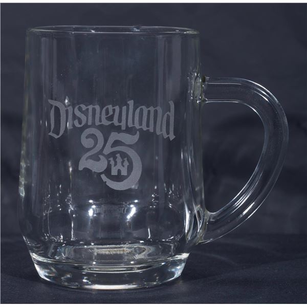 A Disneyland 25th Anniversary Glass Coffee Mug.