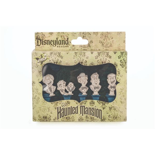 A Disneyland Haunted Mansion Singing Busts Pin Set.