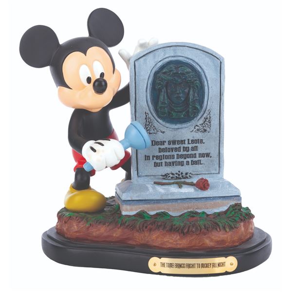 A Mickey Mouse Haunted Mansion Figurine.