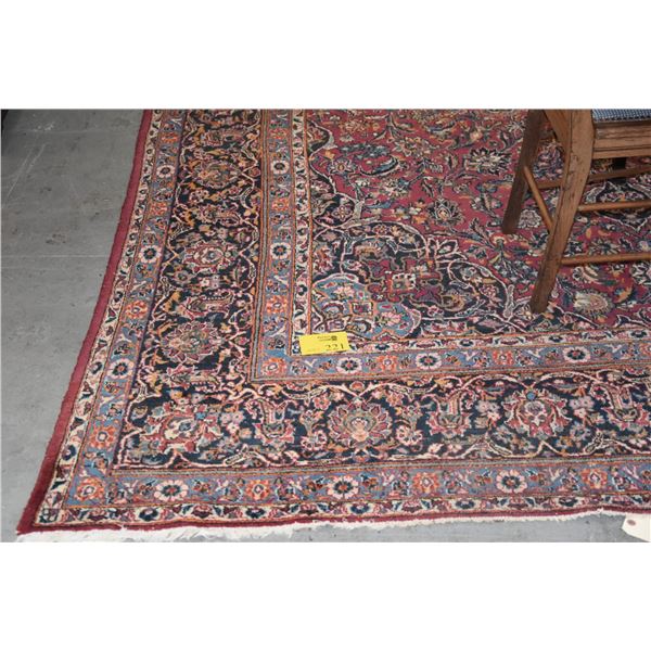 VINTAGE IRANIAN HAND KNOTTED WOOL PILE RUG, BURGUNDY RED FIELD W/CENTER FLORAL MEDALLION SURROUNDED 