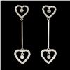 Image 2 : 18K Gold Earrings: 0.68ctw Diamonds