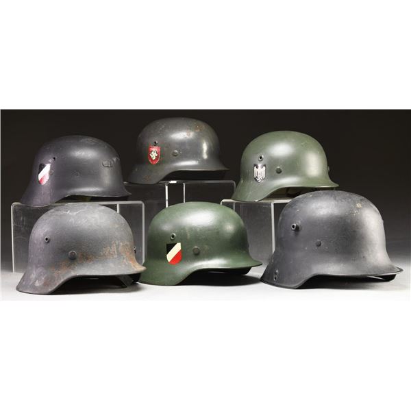 6 WWII GERMAN HELMETS.