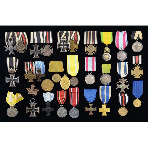 LARGE GROUPING OF MOSTLY GERMAN IMPERIAL MEDALS.