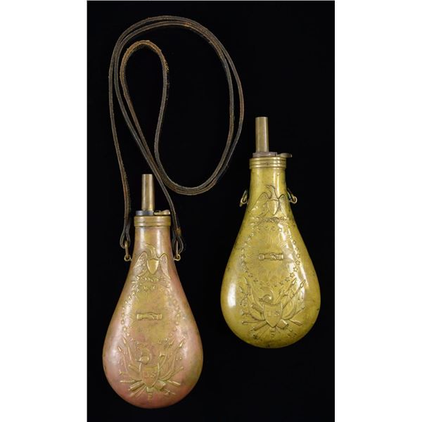 2 REPRODUCTION POWDER FLASKS.