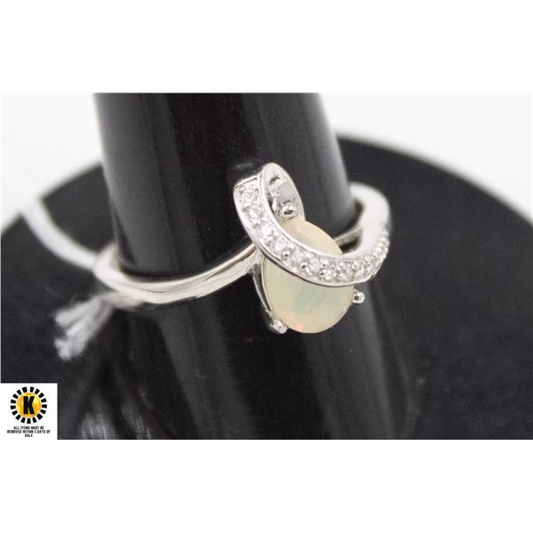# 283-UNHEATED ETHOPIA OPAL & CZ RING SIZE 8.25