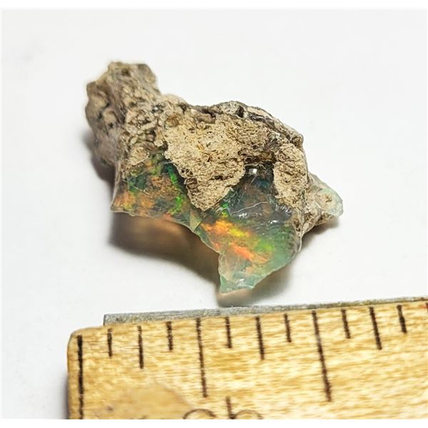 20)  NATURAL ROUGH 4 CT FIRE OPAL.