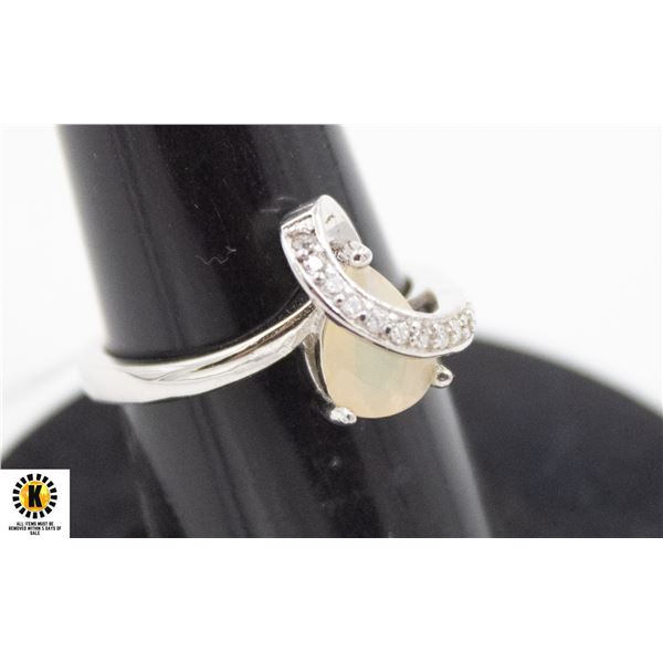 # 279-UNHEATED ETHOPIA OPAL & CZ RING SIZE 6