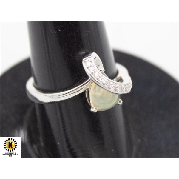 # 280-UNHEATED ETHOPIA OPAL & CZ RING SIZE 7