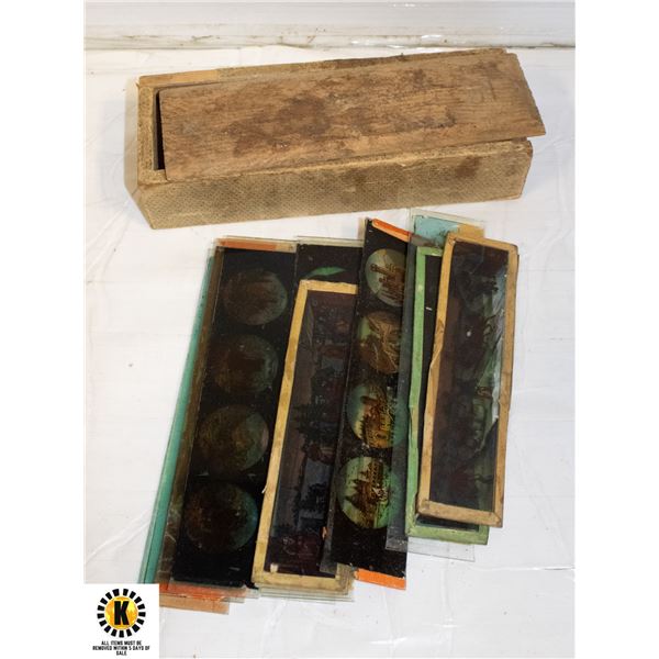 LOT OF ANTIQUE COLOURED GLASS LAMP SLIDES IN BOX