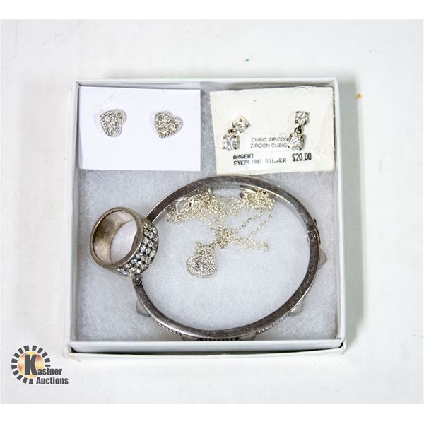 GUESS RING SIZE 7.5 WITH MICHAEL