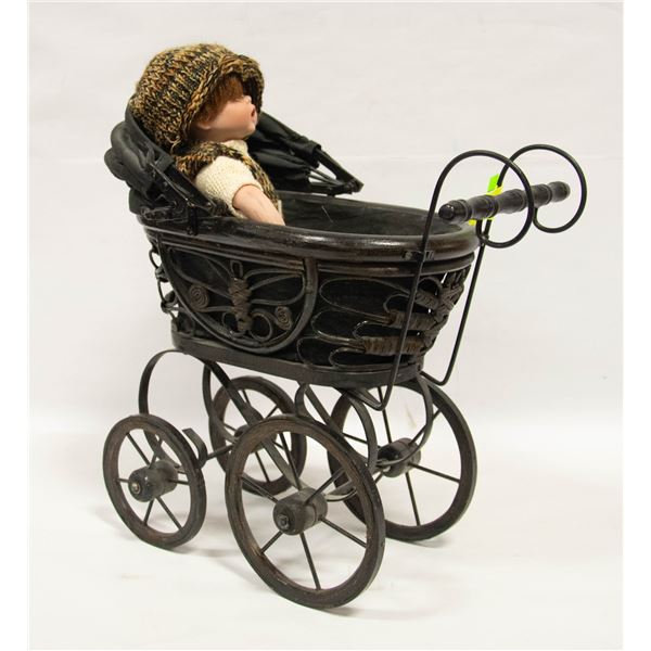 CHILDS PLAY BUGGY WITH DOLL