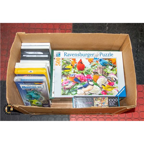 LOT OF PUZZLES & VHS MOVIES