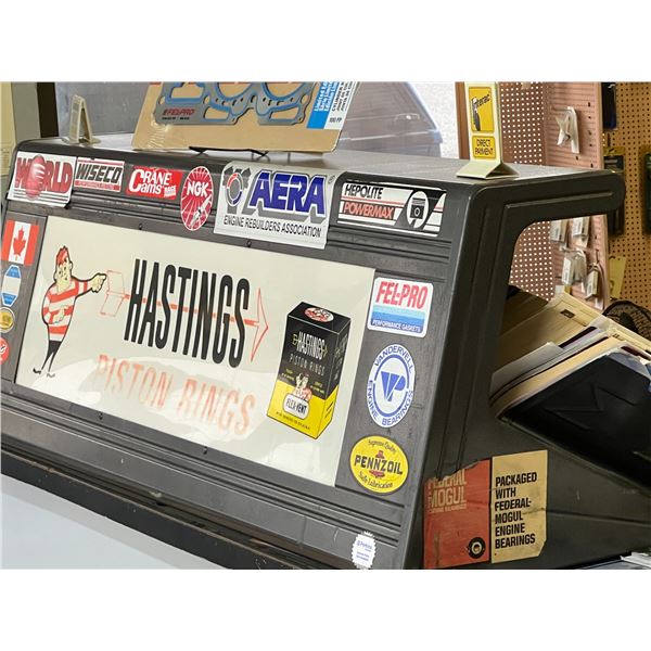 CATALOG DISPLAY RACKS, HASTINGS PISTON LOGO.