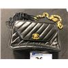 Image 1 : CHANEL BLACK LEATHER QUILTED PURSE WITH GOLD CHAIN STRAP AND FRINGE, MADE IN ITALY -