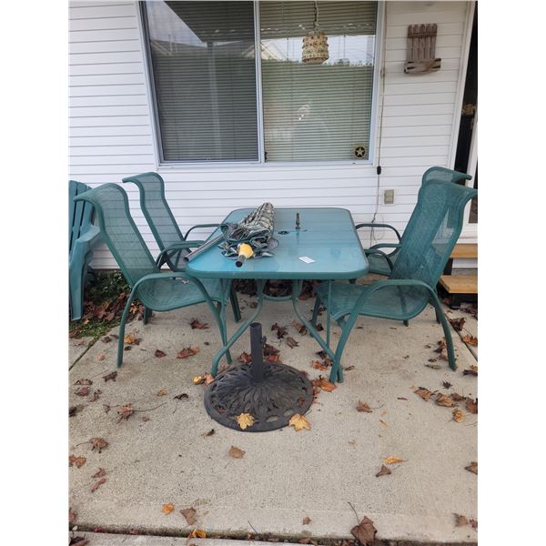 Table, chairs, umbrella cat B