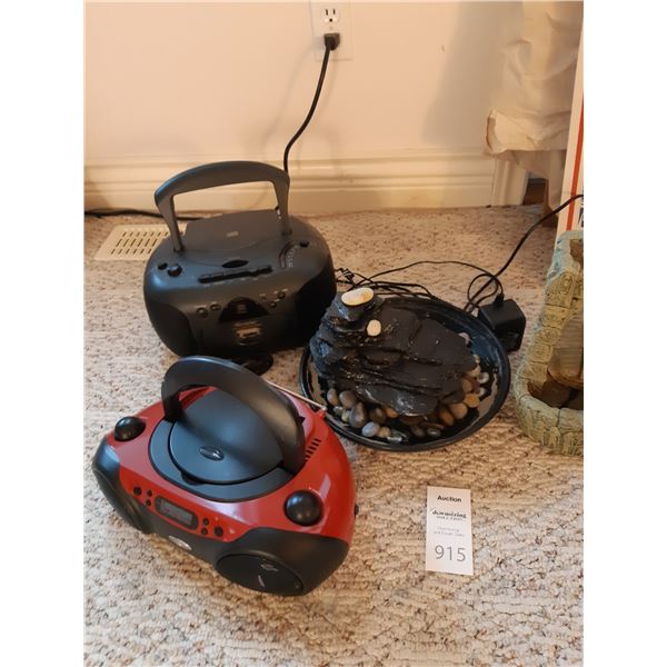 CD Players and Waterfall Decor Cat A