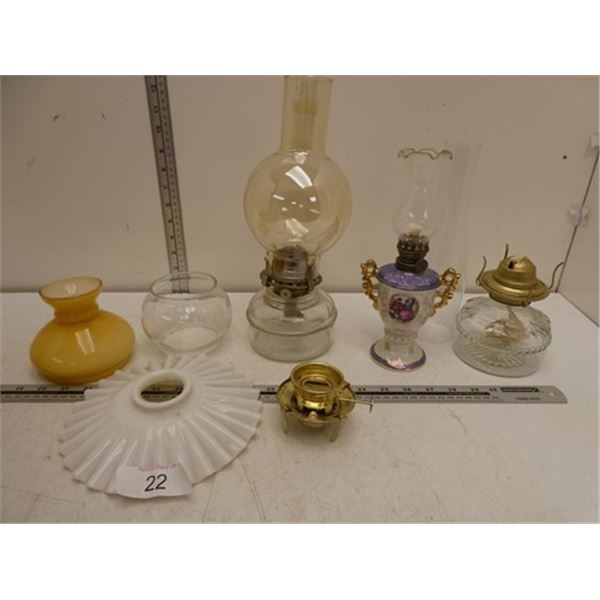 Collection of oil lamps and parts