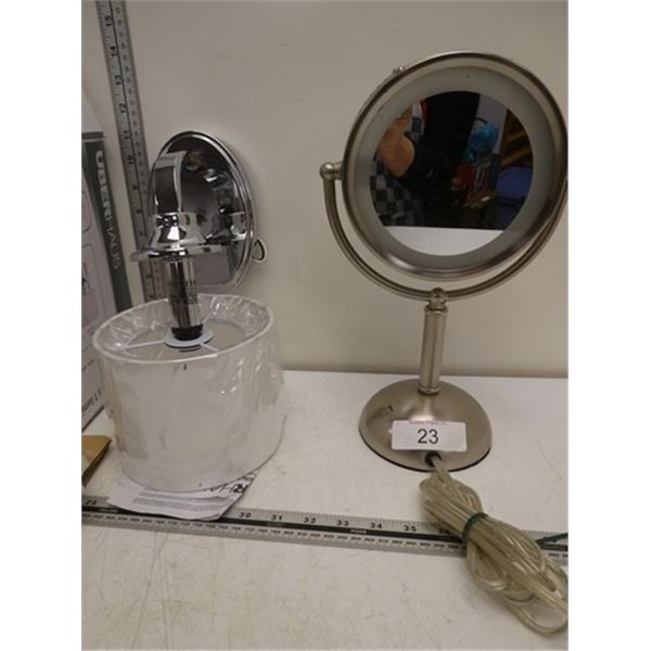 Lighted makeup mirror, wall sconce