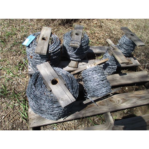 (2) Rolls of Barbed Wire, (4) Partial Rolls of Barbed Wire