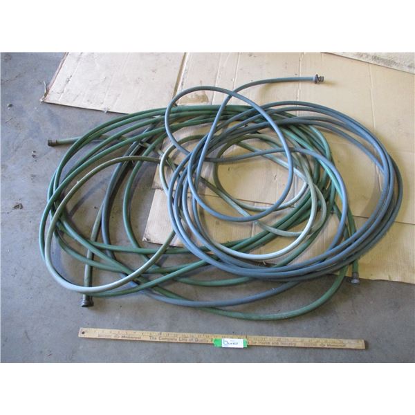 (2) Plastic Garden Hoses