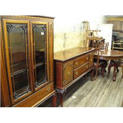 outstanding American dining room suite consisting of ball and claw foot 2 door display cabinet, buff