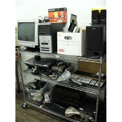 Compaq computer Presario, set of Sony speakers, keyboards, Nintendo entertainment system, Lexmark pr