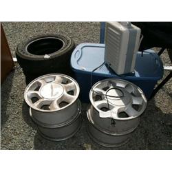 lot of aluminum rims, tires, heater, plastic bin with baseball cards comic books Pokemon cards and e