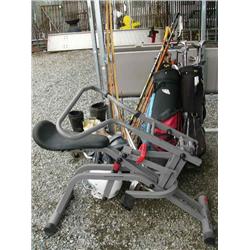 exercise bike, golf clubs, cross-country skis, football helmet, rakes, bunny boots, moto-cross boots