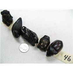 lot of four small wooden carved figures (17)