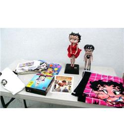 2 porcelain Betty Boop dolls, Betty Boop towel, Betty Boop pendulum clock, assorted Betty Boop paper