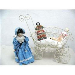 3 China dolls and a wrought iron baby buggy (16)