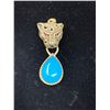 Image 1 : Natural Turquoise 10.18 Carat Cabochon Cut Stone Set in .925 Silver Panther Pendant with Appraisal C